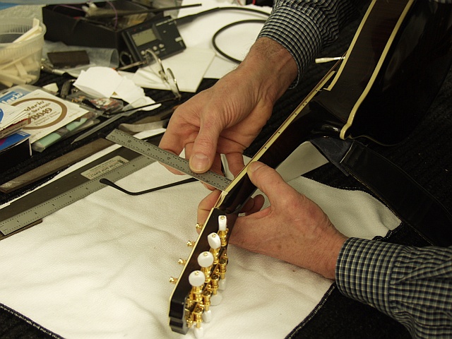 Measuring the string height on a mandolin